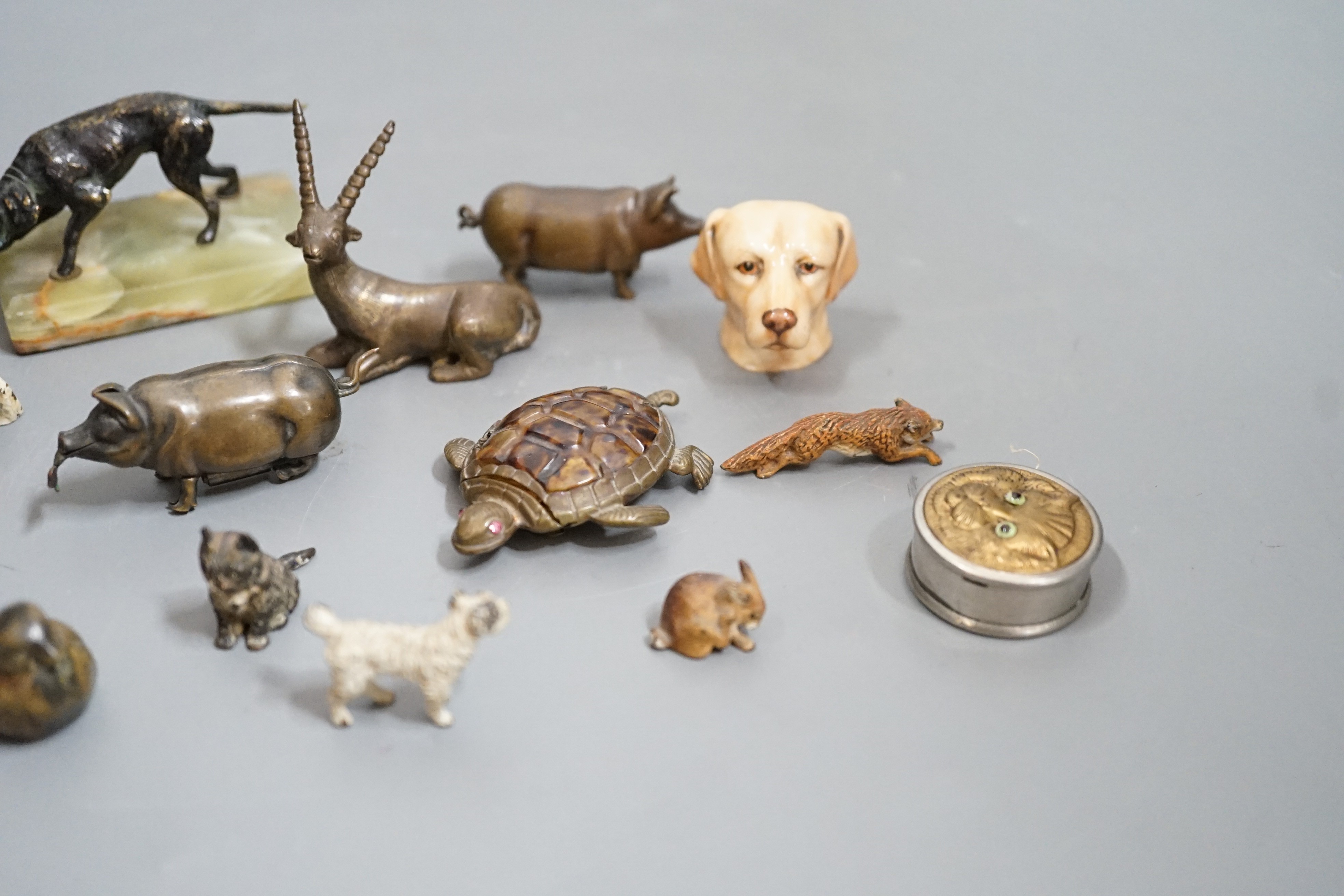 A quantity of animal related collectables including cold painted bronzes, a ‘pig’ tape measure and vesta etc.